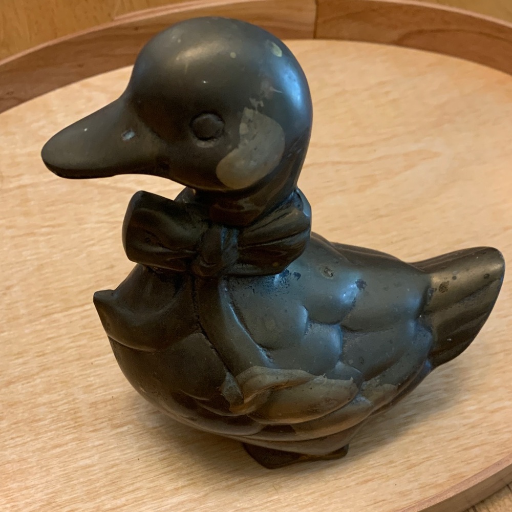 Vintage Brass duck with a bow